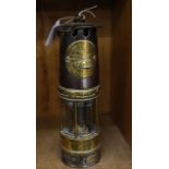 A miner's lamp by Ackroyd & Best Ltd. no. 0429