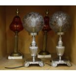 A pair of oil lamps converted into table lamps and a pair of modern table lamps (4) (sold as parts)