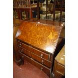 An Edwardian side table and a walnut bureau and a walnut dressing table with three section mirror,