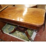 A Regency mahogany tea table on a quadrantile base 107cm wide