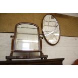 A 19th Century mahogany dressing mirror and oval mirror