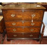 A George III mahogany and inlaid secretaire chest, circa 1800, the secretaire drawer with hinged