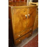 An Art Deco walnut cabinet