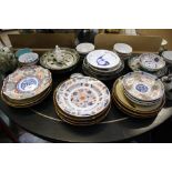 A quantity of Oriental ceramics to include Imari dishes, bowls, a miniature blanc de Chine figure