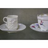 A Worcester cup and saucer, a Chinese blue and white tea bowl and saucer, a Wedgwood cup, a cut