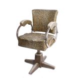 A leopard print barbers chair