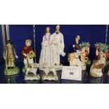 A quantity of Staffordshire figure groups to include 'Prince and Princess', 'Old Age' etc and
