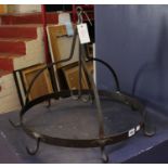 A wrought iron pan rack