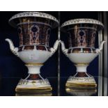 A pair of Royal Crown Derby two handled Pedestal vases, 'Old Imari' pattern, 20cm high