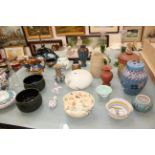 A mixed lot of ceramics and glassware to include Poole Pottery, Doulton Lambeth etc