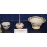 A Herend bowl, decorated with three leaf clovers, 14cm in diameter, a small Herend bowl and a lidded