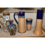 A group of Royal Doulton Lambeth jugs and vases