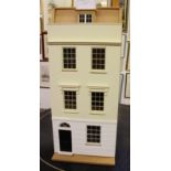 A modern Georgian style dolls town house incl. furniture