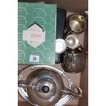 A quantity of silverplate to include teapots, milk jugs, sugar bowls, cased spoons, loose cutlery