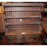 An 18th Century style miniature oak dresser, a Victorian style five drawer chest and further bank of