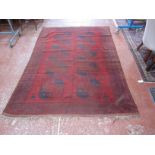 An Afghan carpet 251 x 170cm