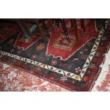 A Hamadan carpet 311 x 192cm