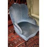 A late Victorian blue upholstered easy chair