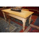 A pine refectory kitchen table on turned legs 199cm length