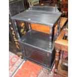 A Victorian ebonised two tier cabinet with a cupboard below 60cm wide