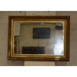 A gilt composition rectangular wall mirror 69 x 94cm, together with another gilt example (2)