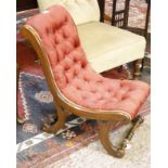 A Victorian button back slipper chair together with a further Victorian low button back chair