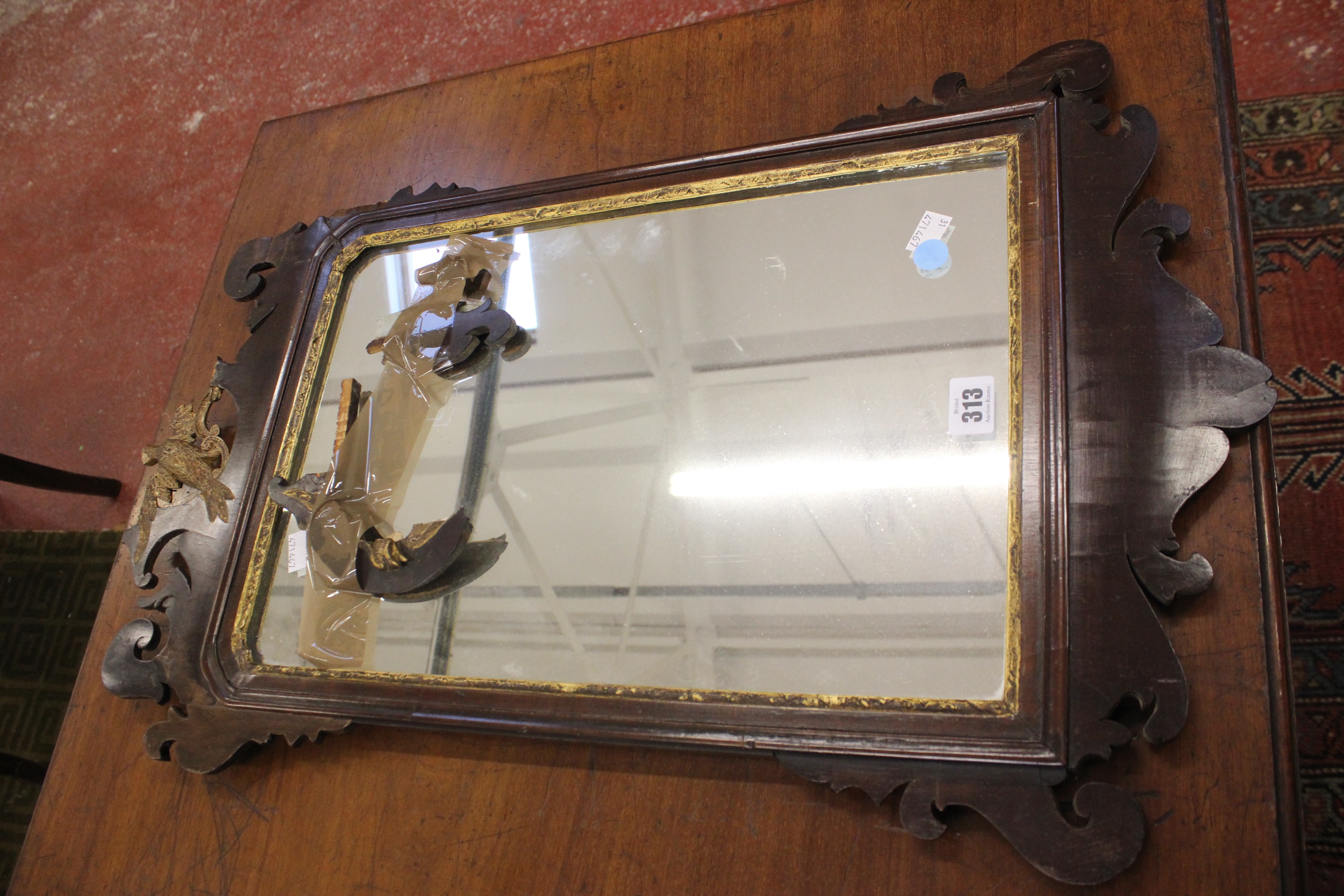 A George II style mahogany fretwork mirror