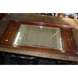 An Edwardian mahogany and inlaid overmantel mirror 62cm high, 125cm wide