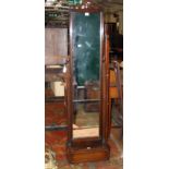 A late Victorian mahogany cheval mirror bearing plaque Sexton & Co Ltd