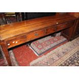 A cherrywood console/hall table with two drawers on square tapering legs 180cm wide