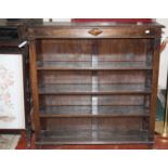 A late Victorian oak open bookcase with adjustable open shelves 108cm wide