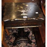 A Victorian ebonised and mother of pearl inlaid work table
