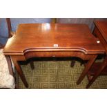 A Georgian mahogany foldover tea table 79cm wide