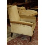 A late Victorian upholstered armchair