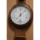 An English wall barometer/thermometer.