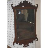 A George II style mahogany fretwork mirror 77cm high, 47cm wide