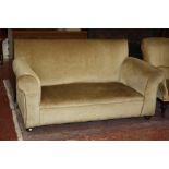 A late Victorian upholstered two seater sofa