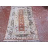 A Turkish carpet 234cm x 148cm