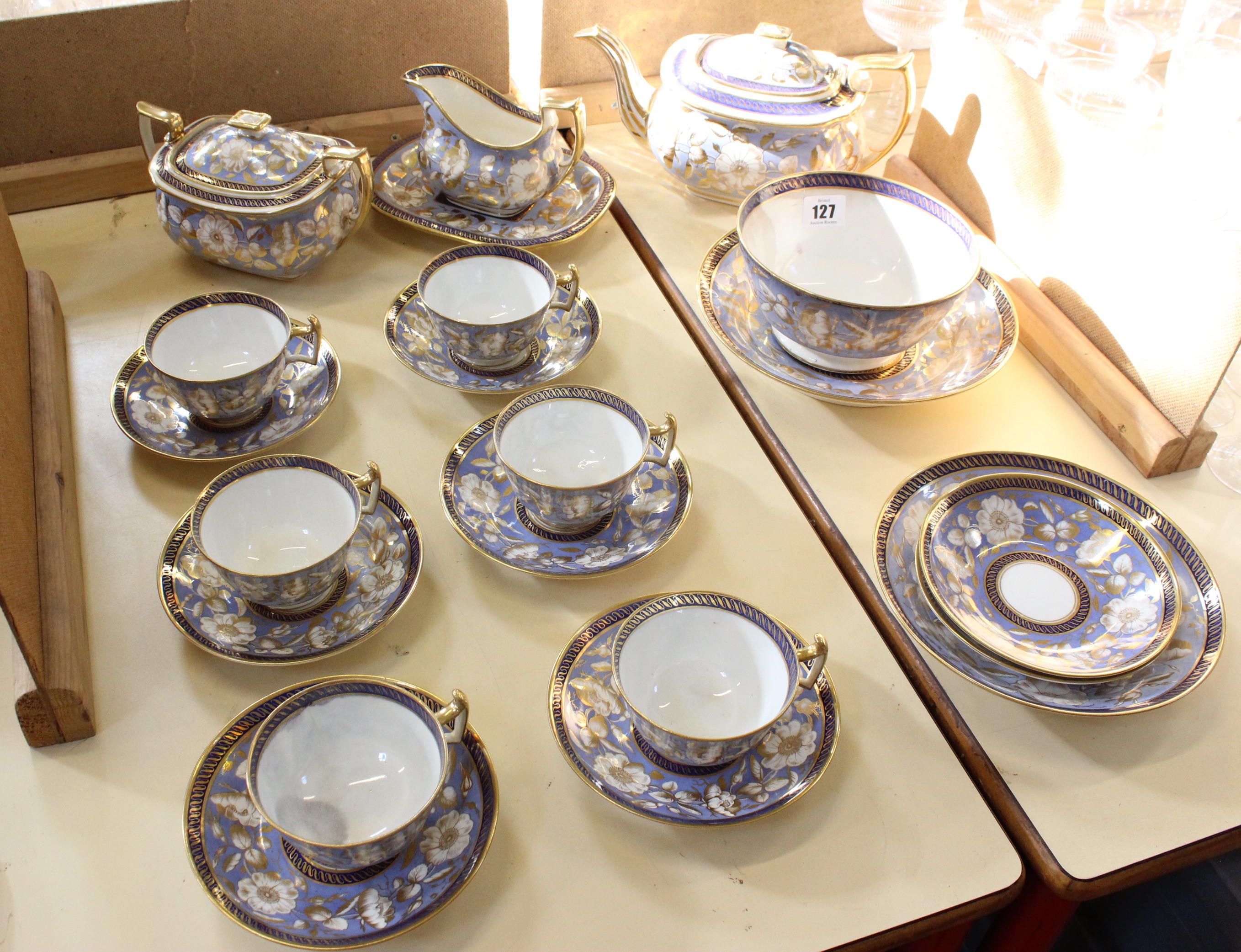 An early 19th century Ridgway part tea service, to include tea pot, slop bowl, milk jug, sugar