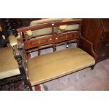 An Edwardian mahogany and inlaid two seater sofa