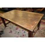 A farmhouse type refectory table, 19th century, the rectangular plank top above tapering square