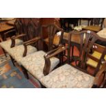 A pair of Sheraton shield mahogany back dining chairs and a pair of vertical splat carver chairs