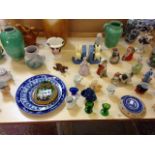 A quantity of decorative ceramics and glassware to include a Staffordshire figure of a cricketer,