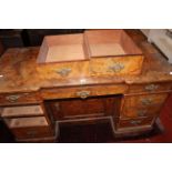 A Victorian burr walnut pedestal desk, (lacking superstructure) bearing stamp to drawer HEAL & SON