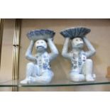 A pair of modern Chinese blue and white porcelain monkeys, 29cm high