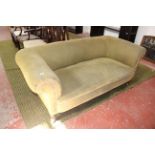 A green upholstered sofa