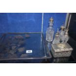 A glass and plated dressing table set and a square glass dish