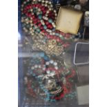 A quantity of costume jewellery, to include a 9ct gold cased ladies wristwatch, other