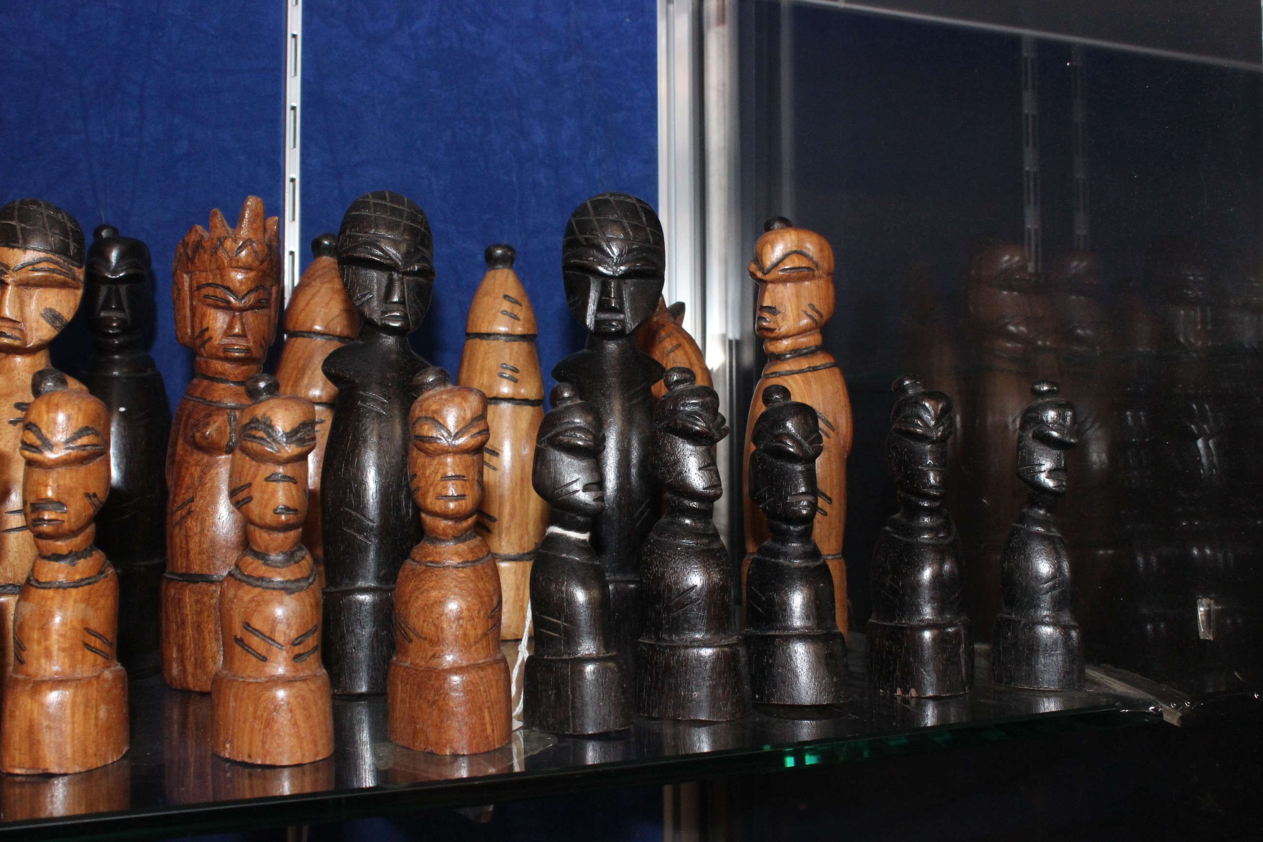 A 20th Century African wooden chess set (32 pieces) and another smaller chess set - Image 2 of 2
