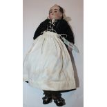 A 19th Century German bisque head doll